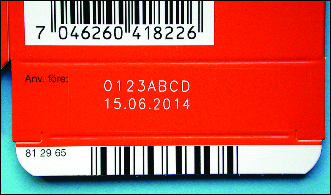 A barcode on a red carton
